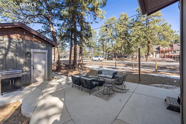 404 S Willow St, Woodland Park, CO 80863 - view of patio / terrace featuring an outdoor hangout area and an outdoor structure
