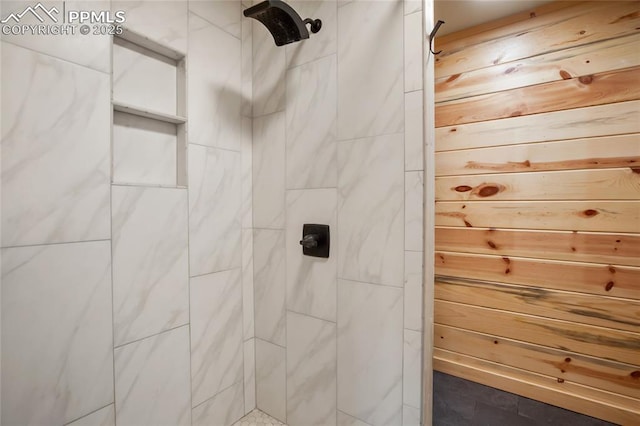 621 Yorktown Rd, Cripple Creek, CO 80863 - full bathroom featuring a tile shower and wooden walls