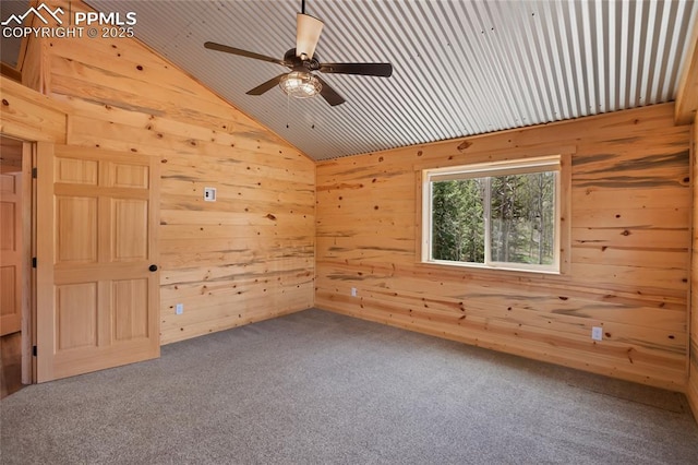 621 Yorktown Rd, Cripple Creek, CO 80863 - additional living space featuring lofted ceiling, wood walls, carpet floors, and ceiling fan