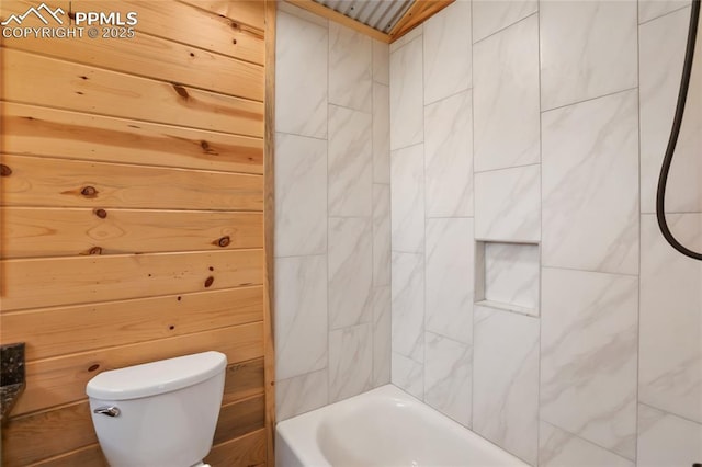 621 Yorktown Rd, Cripple Creek, CO 80863 - full bathroom with toilet, washtub / shower combination, and wooden walls