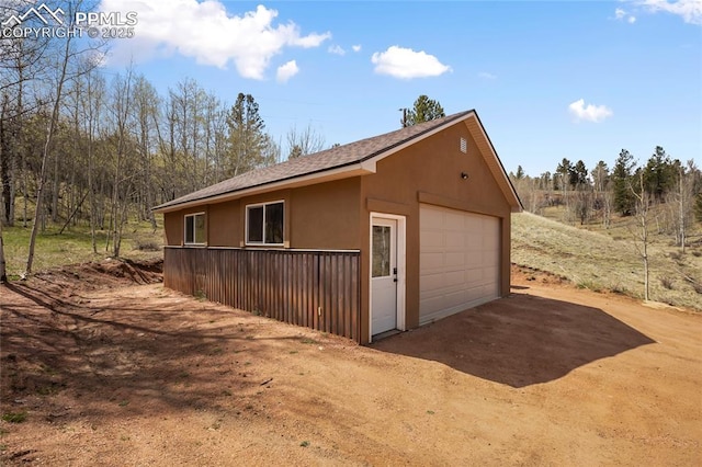 621 Yorktown Rd, Cripple Creek, CO 80863 - detached garage featuring driveway