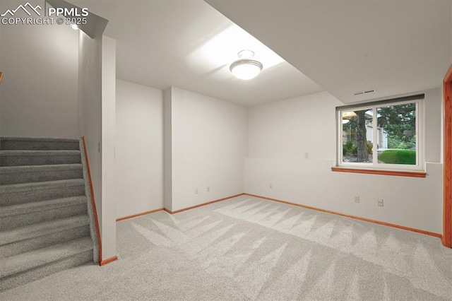 8110 Routt Ct, Colorado Springs, CO 80919 - basement featuring carpet and stairway