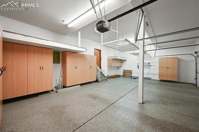 8110 Routt Ct, Colorado Springs, CO 80919 - garage with a garage door opener and electric panel