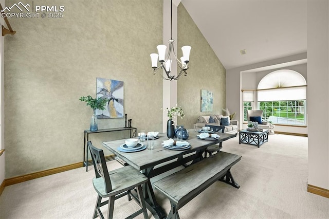 8110 Routt Ct, Colorado Springs, CO 80919 - dining room featuring high vaulted ceiling, carpet floors, and a chandelier