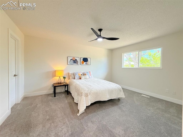 4770 Newton Dr, Colorado Springs, CO 80916 - bedroom with carpet floors, a textured ceiling, baseboards, and ceiling fan