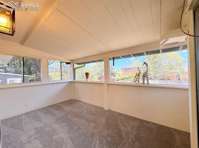 4770 Newton Dr, Colorado Springs, CO 80916 - unfurnished sunroom featuring carpet flooring and vaulted ceiling