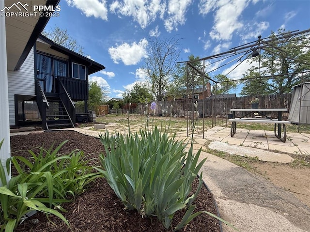 4770 Newton Dr, Colorado Springs, CO 80916 - view of yard featuring a patio area and stairs