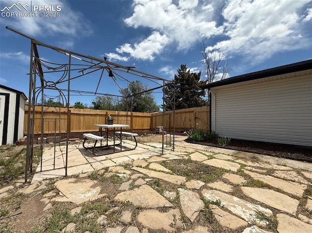 4770 Newton Dr, Colorado Springs, CO 80916 - fenced backyard with a patio
