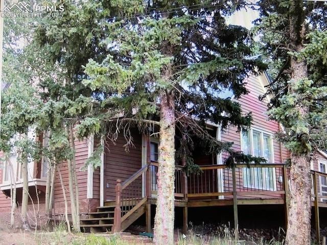 304 N 4th St, Victor, CO 80860 - back of house featuring a deck