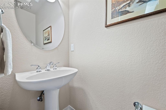 6678 Bethesda Pt Unit C, Colorado Springs, CO 80918 - bathroom with a textured wall