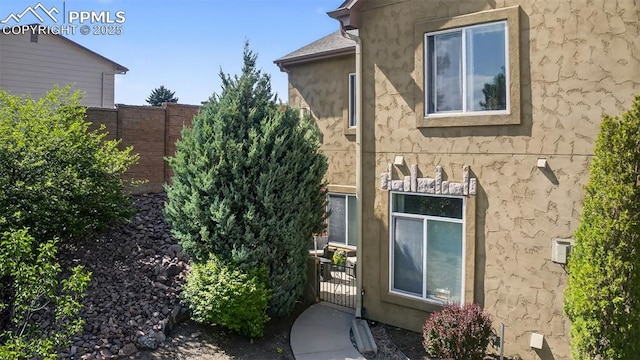 6678 Bethesda Pt Unit C, Colorado Springs, CO 80918 - view of side of property with stucco siding
