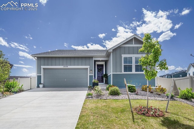 10144 Bluffstone Ct, Peyton, CO 80831 - ranch-style home with an attached garage, board and batten siding, and concrete driveway