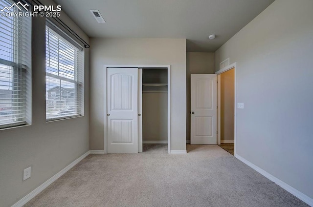 10144 Bluffstone Ct, Peyton, CO 80831 - unfurnished bedroom featuring carpet floors, a closet, and baseboards