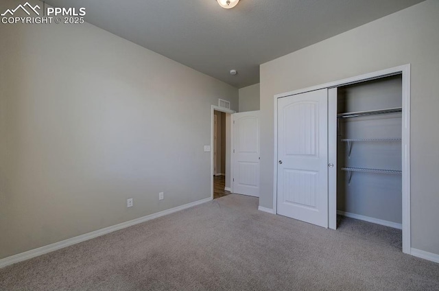 10144 Bluffstone Ct, Peyton, CO 80831 - unfurnished bedroom featuring carpet flooring, baseboards, and a closet