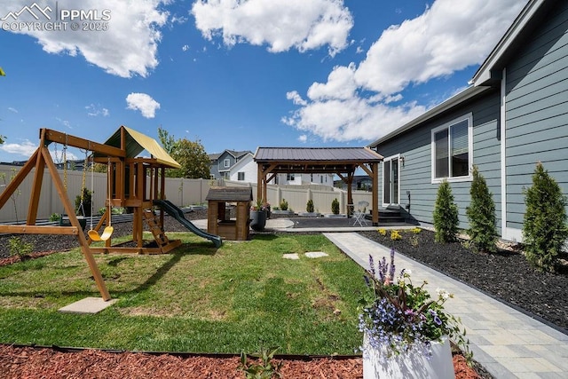 10144 Bluffstone Ct, Peyton, CO 80831 - view of yard featuring a gazebo, a playground, and a patio