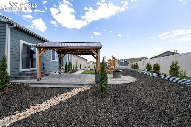 10144 Bluffstone Ct, Peyton, CO 80831 - view of yard with a gazebo, a playground, and a patio