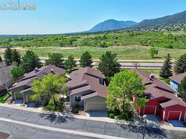 2609 Freedom Hts, Colorado Springs, CO 80904 - aerial perspective of suburban area featuring a mountain backdrop