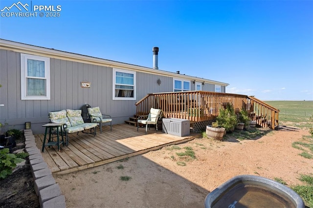 9180 S Rush Rd, Rush, CO 80833 - back of property with a wooden deck
