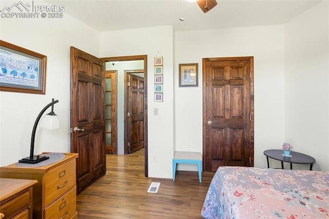 9180 S Rush Rd, Rush, CO 80833 - bedroom with dark wood-type flooring