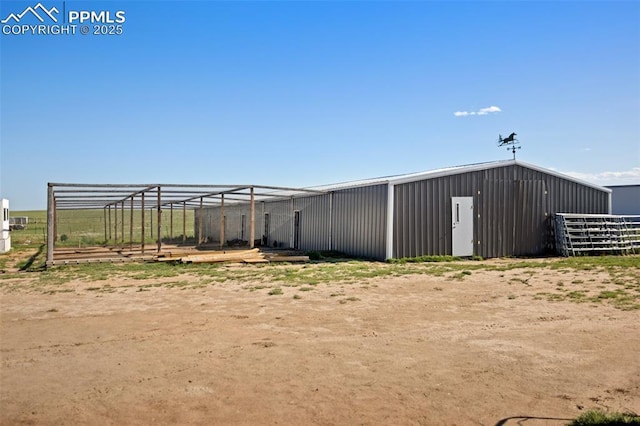 9180 S Rush Rd, Rush, CO 80833 - view of yard featuring an outbuilding and a pole building