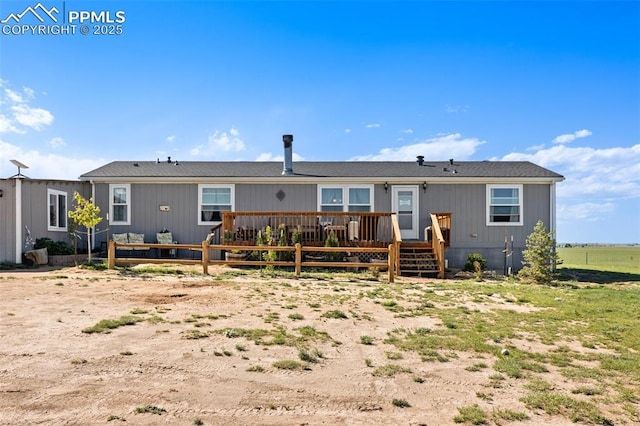 9180 S Rush Rd, Rush, CO 80833 - rear view of house featuring a wooden deck