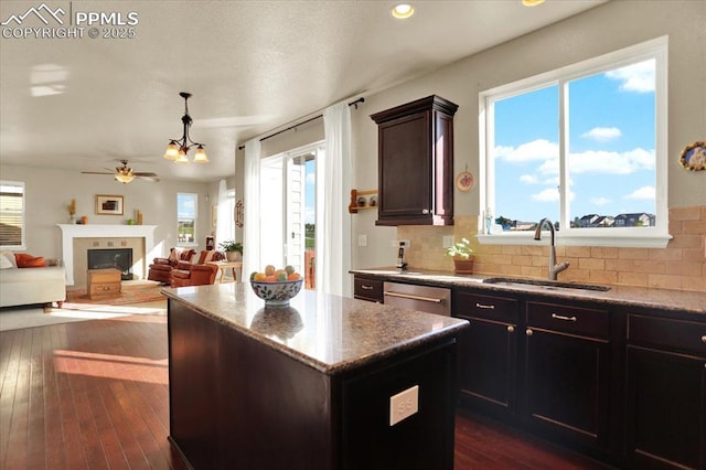 9773 Beryl Dr, Peyton, CO 80831 - kitchen with a sink, tasteful backsplash, ceiling fan, healthy amount of natural light, and recessed lighting