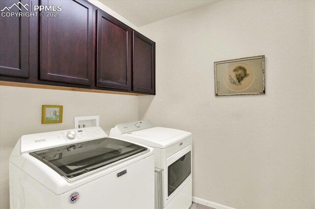 9773 Beryl Dr, Peyton, CO 80831 - laundry area with washing machine and dryer, cabinet space, and baseboards