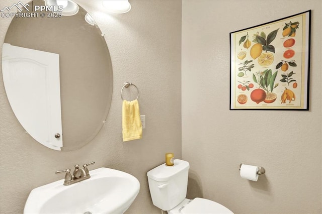 9773 Beryl Dr, Peyton, CO 80831 - bathroom with a sink and toilet