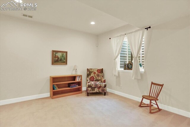 9773 Beryl Dr, Peyton, CO 80831 - living area with carpet floors, baseboards, and recessed lighting