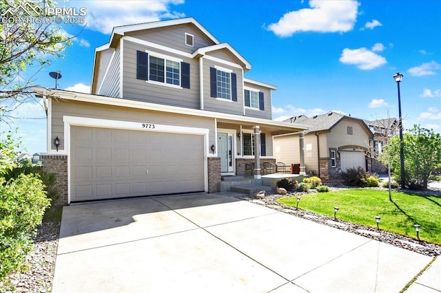 9773 Beryl Dr, Peyton, CO 80831 - traditional-style house with brick siding, a porch, driveway, and a front lawn