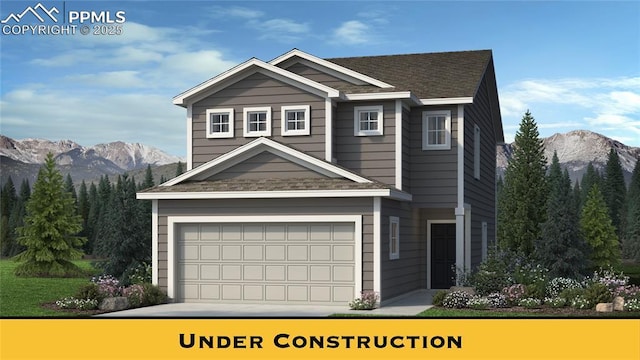 10811 Raylan Way, Falcon, CO 80831 - view of front of home featuring a mountain view, a garage, concrete driveway, and a shingled roof