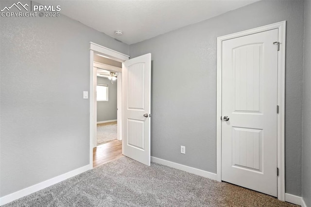 1210 Westend Ave, Colorado Springs, CO 80904 - unfurnished bedroom with carpet floors and baseboards