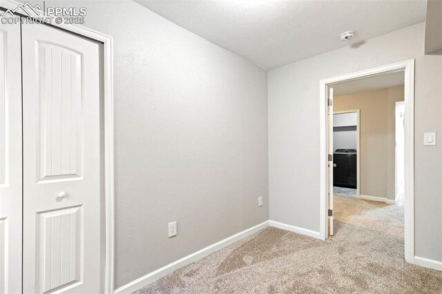 1210 Westend Ave, Colorado Springs, CO 80904 - carpeted empty room with a smoke detector and baseboards