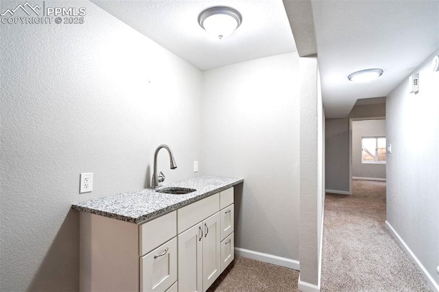 1210 Westend Ave, Colorado Springs, CO 80904 - bar with a sink, carpet floors, and baseboards