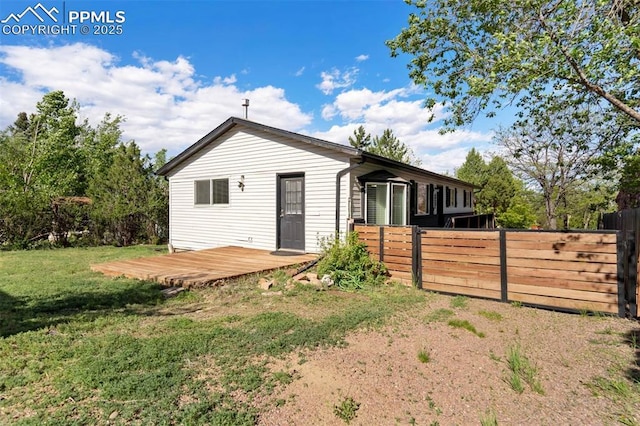 1210 Westend Ave, Colorado Springs, CO 80904 - rear view of house with a wooden deck