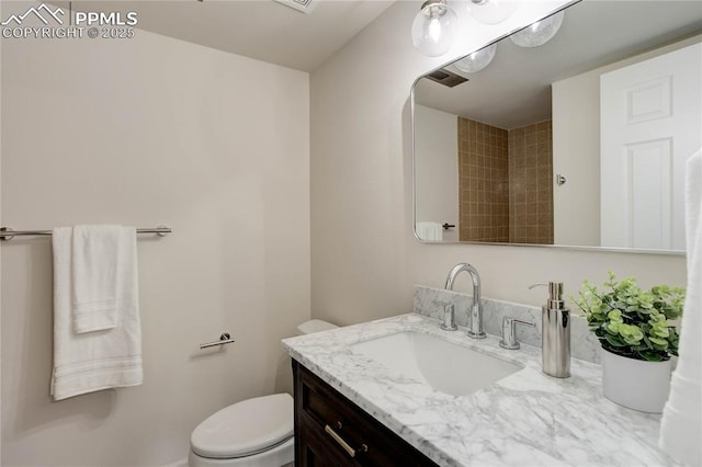 5208 Pinon Valley Rd, Colorado Springs, CO 80919 - bathroom featuring vanity and toilet