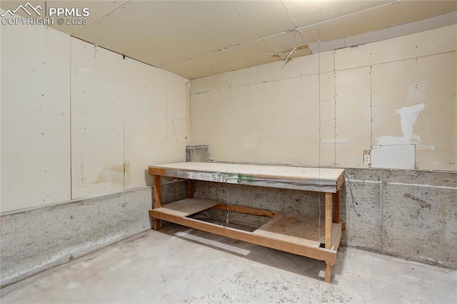 5208 Pinon Valley Rd, Colorado Springs, CO 80919 - basement with a workshop area