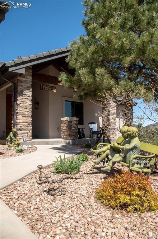 797 Forest View Way, Monument, CO 80132 - property entrance with stone siding and stucco siding