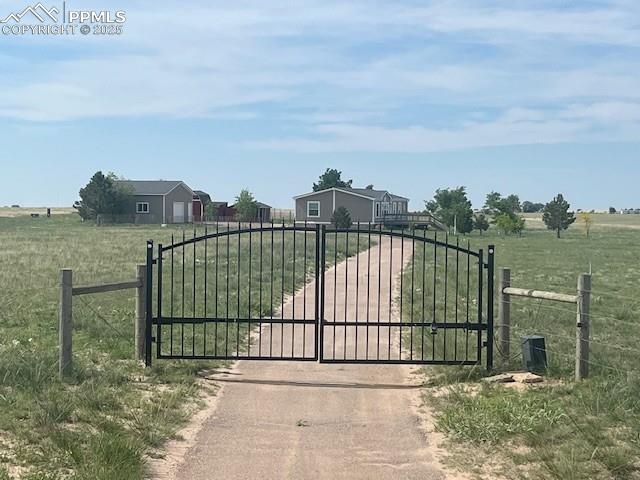 20150 Enoch Rd, Colorado Springs, CO 80930 - gate with a view of rural / pastoral area