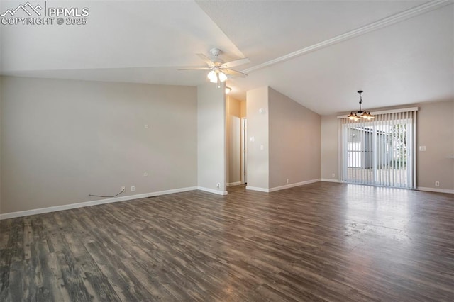 20150 Enoch Rd, Colorado Springs, CO 80930 - empty room with vaulted ceiling, a chandelier, baseboards, dark wood-type flooring, and ceiling fan