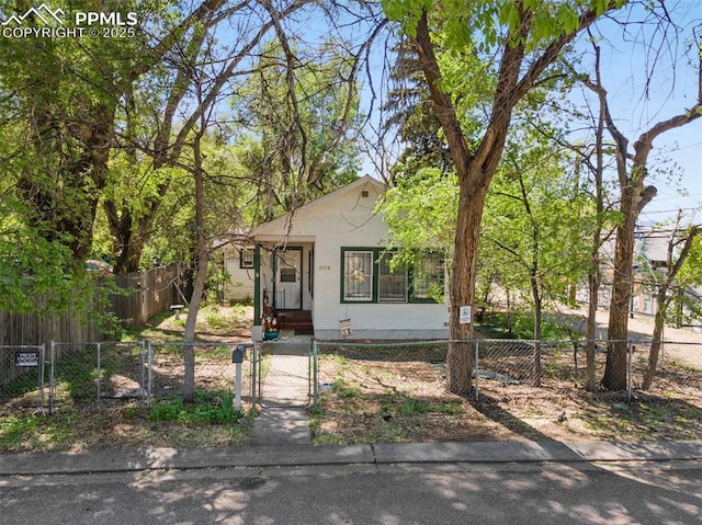 1416 S Wahsatch Ave, Colorado Springs, CO 80905 - bungalow-style house featuring a gate and a fenced front yard