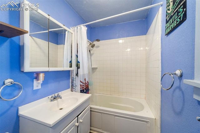 1416 S Wahsatch Ave, Colorado Springs, CO 80905 - bathroom with vanity, shower / bathtub combination with curtain, and a textured wall