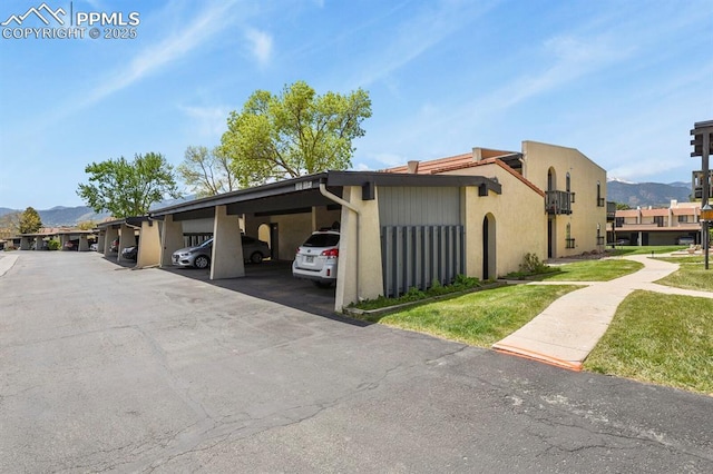 1018 Fontmore Rd Unit D, Colorado Springs, CO 80904 - covered parking lot with a mountain view