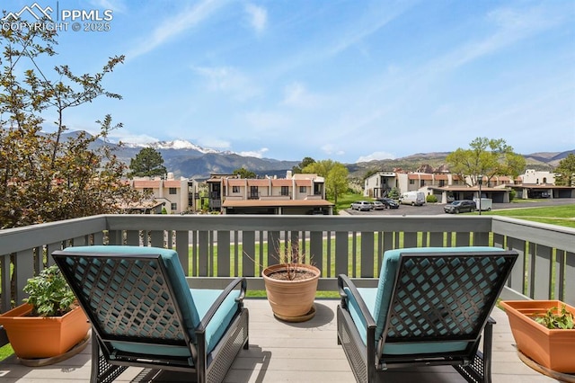 1018 Fontmore Rd Unit D, Colorado Springs, CO 80904 - wooden terrace with a residential view and a mountain view