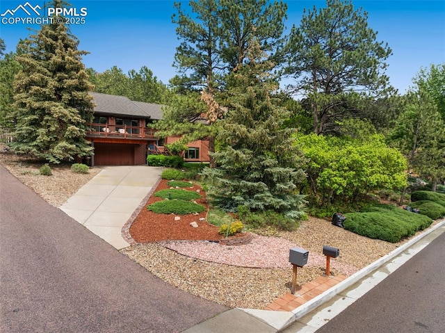 720 Popes Valley Dr, Colorado Springs, CO 80919 - view of front of property with concrete driveway and an attached garage