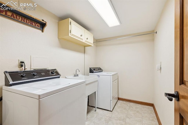 720 Popes Valley Dr, Colorado Springs, CO 80919 - washroom featuring washing machine and dryer, cabinet space, and baseboards