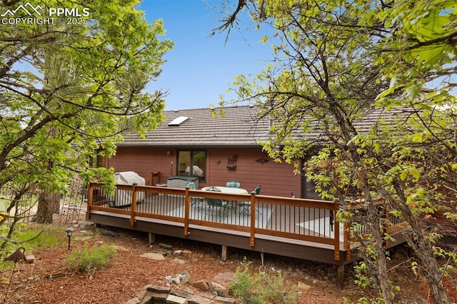 720 Popes Valley Dr, Colorado Springs, CO 80919 - rear view of house featuring a deck