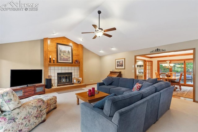 720 Popes Valley Dr, Colorado Springs, CO 80919 - living area featuring lofted ceiling, carpet floors, ceiling fan, a tiled fireplace, and a chandelier
