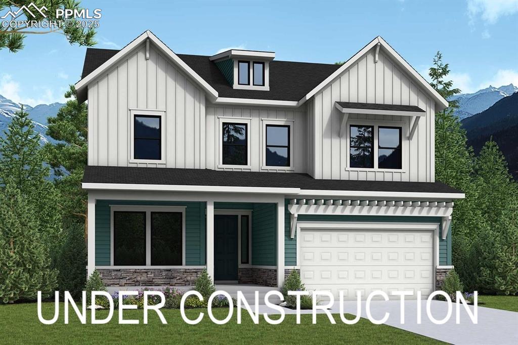 17137 Alsike Clover Ct, Monument, CO 80132 - view of front of home with board and batten siding, stone siding, and a mountain view