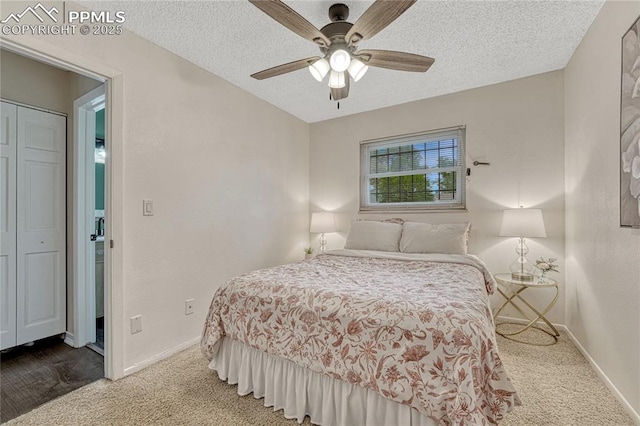 7108 Chippewa Rd, Colorado Springs, CO 80915 - carpeted bedroom with a textured ceiling and ceiling fan